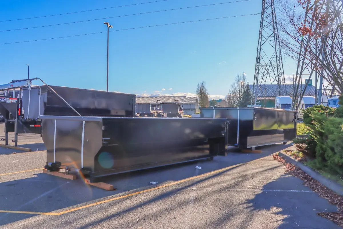 Roll-off dumpster ready for waste disposal at job site for Concrete Dumpster Rental in Loveland